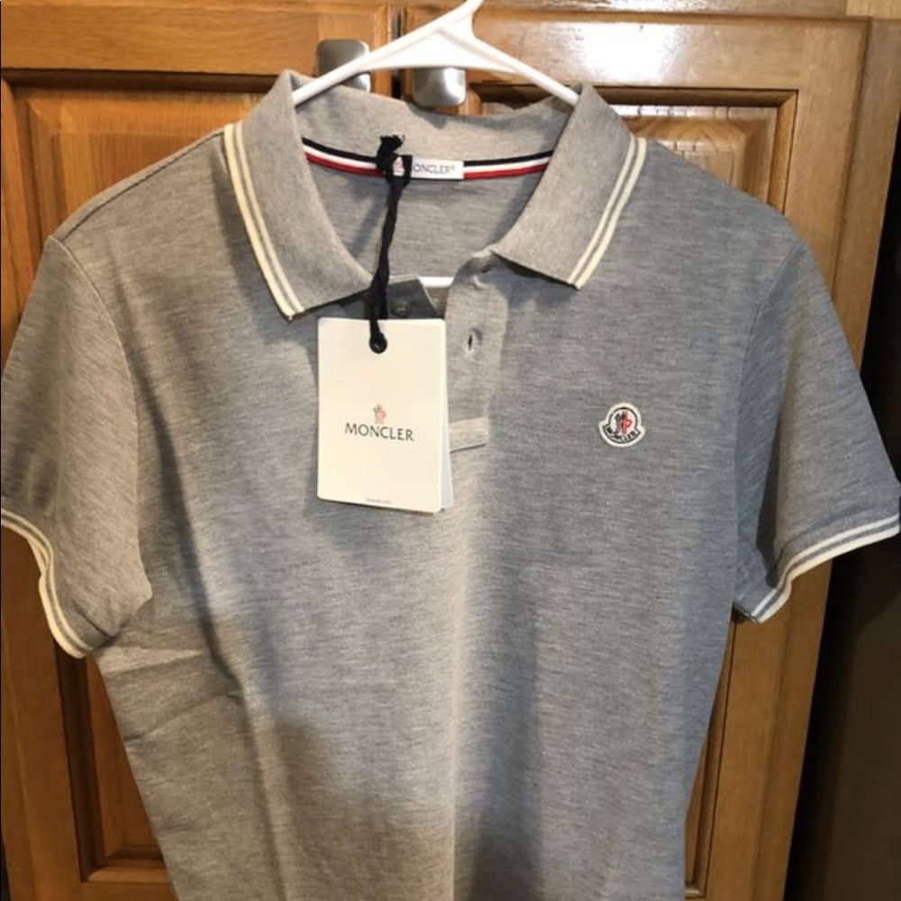 Moncler polo medium with tags